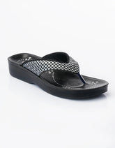 Black sandal with a checkered strap on a white background