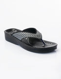 Black sandal with a checkered strap on a white background